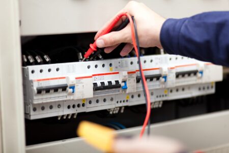 An electrician at work in Mindarie
